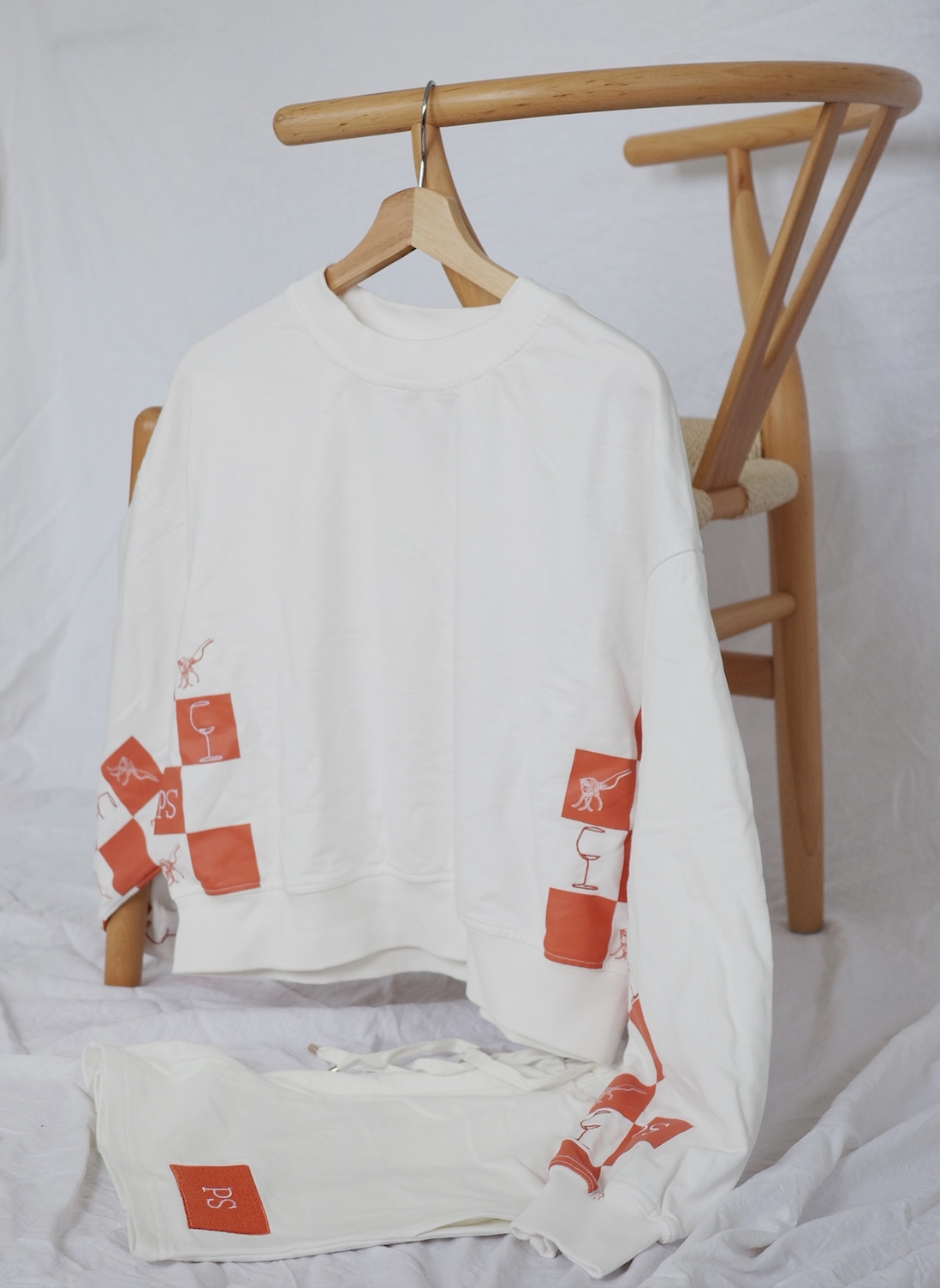 "pasta and vino, Pasta, wine clothing ,pickeball, loungwear, comfortable loungewear, tennis outfit, womens fashion, mens fashion, loungewear sets, embroidered clothing, hand drawn embroidery, tennis hoodie, tennis sweater, lifestyle clothing, menswear, womenswear, best loungewear brands, pasta jumper".